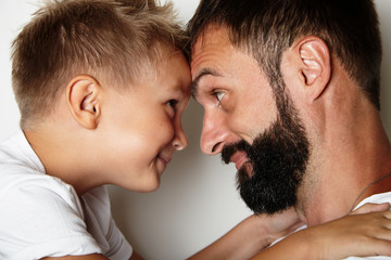 Obraz premium Portrait of a bearded man and young cute boy 