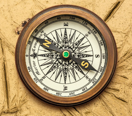 Fototapeta na wymiar Vintage brass compass