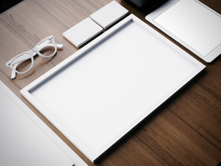 White business blank elements on a wooden table. 3d render