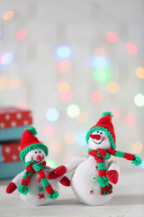 Cute snowmen on Christmas background