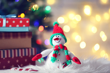 Cute snowman on Christmas background