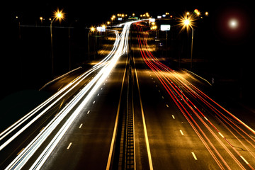 Fototapeta na wymiar Highway at night in the motion