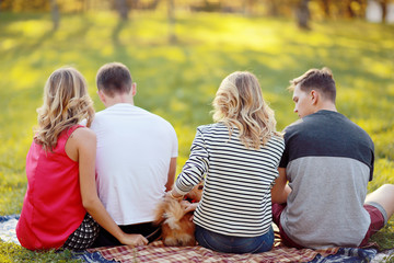 young people in autumn park in Europe