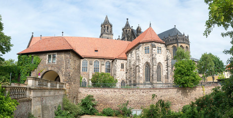 Fototapeta na wymiar River side of Magdeburg Cathedral (Protestant Cathedral of Magdeburg Mauritius and St. Catherine) - one of the oldest Gothic buildings in Germany.