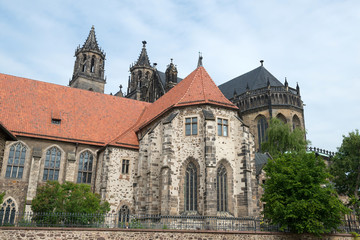 Fototapeta na wymiar River side of Magdeburg Cathedral (Protestant Cathedral of Magdeburg Mauritius and St. Catherine) - one of the oldest Gothic buildings in Germany.