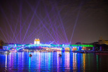 Fototapeta na wymiar The opening of the Festival Circle Of Light. Andreevskiy Bridge.