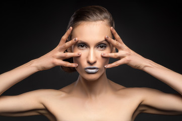 Fototapeta premium High fashion look, closeup beauty portrait bright makeup, colorful blue bright lips