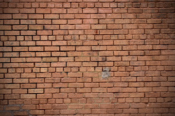 Hintergrund verwitterte braune Backsteinwand