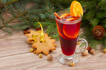 mulled wine with decorated christmas tree
