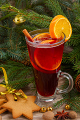 mulled wine with decorated christmas tree