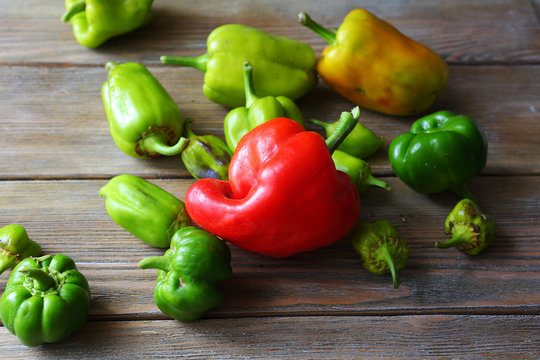 fresh ripe pepper on boards