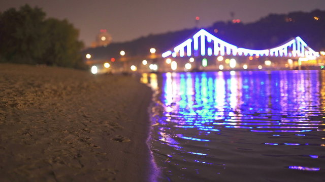 10 in 1 video! The picturesque embankment by night city and bridge lights background. Time lapse capture. Shot with Red Cinema Camera