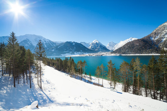 Winter landscape with beautiful mountain lake in the Alps, Achensee, Austria.
