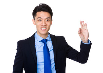 Businessman showing with ok sign
