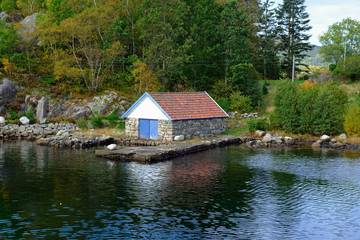Fototapeta na wymiar norwegian boat house of granite