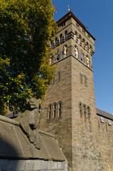 Cardiff Castle clock tower with lioness statue