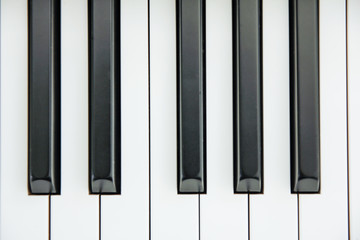 Close-up of Piano Keyboard centred on Ab with plenty of white sp