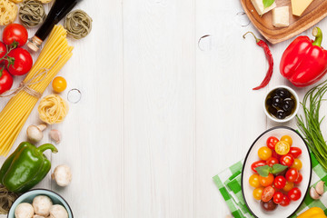 Italian food cooking ingredients. Pasta, vegetables, spices
