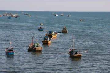 Fototapeta premium hundreds of fishing boats parked in the bay