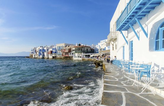 Little venice,aka Lefkandra,mikri Venetia a landmark of Chora on greek island Mykonos, Greece.Picturesque coffee shops and restaurants overlooking the aegean with balconies hanging over the blue sea.