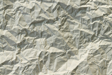 Light brown creased paper background texture