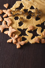 Cooking sweet biscuits in the shape of butterflies close-up. Vertical
