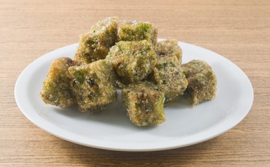 Plate of of Fried Steamed Dumpling Made of Garlic Chives