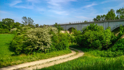 Fototapeta na wymiar Steinerne Eisenbahnbrücke über der March