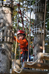 adventure climbing high wire park - people on course in mountain