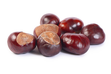 Mature chestnuts isolated on white background