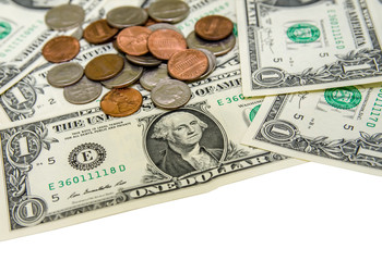 American one dollar with different coins isolated on white background