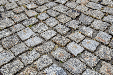 Wet cobblestone road