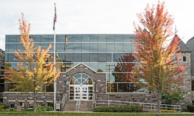 The state courthouse for the 86th District in Traverse City, Michigan with autumn colors