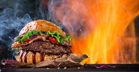 Home made Burger with fire flames