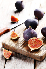 Fresh figs on a wooden cutting board
