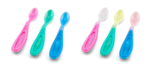 Plastic baby spoon - heat and thermo sensitive - isolated on whi
