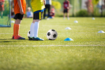 Obraz premium kids playing football soccer match