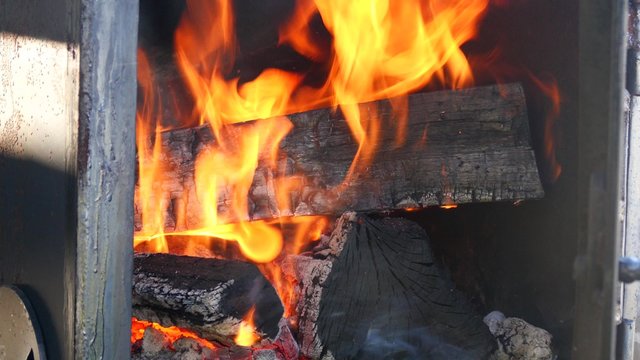 Fire Burning In A Firebox Of A Barbecue Smoker