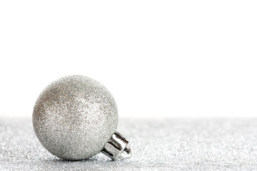 New year or Christmas toys on silver glitter background