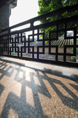 fence shadow on the floor