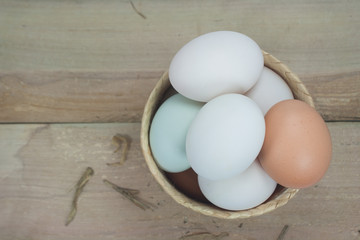 Still Life- eggs in a wicker container View from the top.
