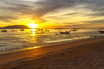 Sunrise and fishing boat