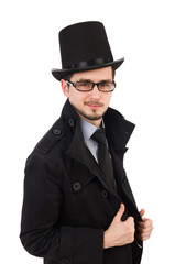 Young man in coat and hat isolated on white