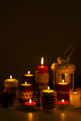 Christmas handmade. Christmas candles in the candle holders knit