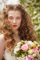 Naklejka premium Young bride with flowers