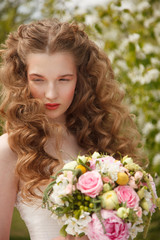 Fototapeta premium Young bride with flowers