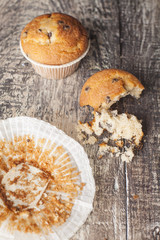 Chocolate muffin on a wooden background