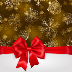 Christmas background with snowflakes and red bow