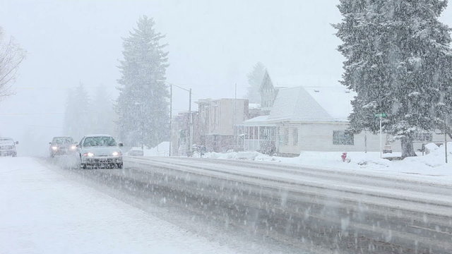 Cars driving through snow blizzard P HD 8663