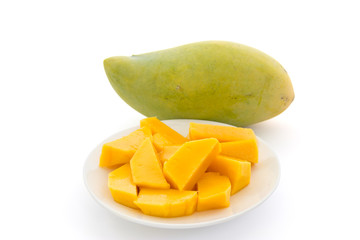 Mango slices in plate isolated on white background